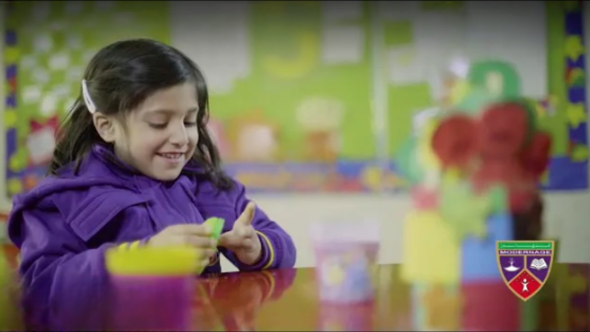 Kindergarten girl learning with colorful clay