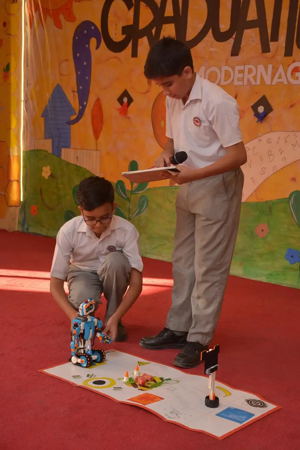 Students Demonstrating Robotics Project at Modernage Event