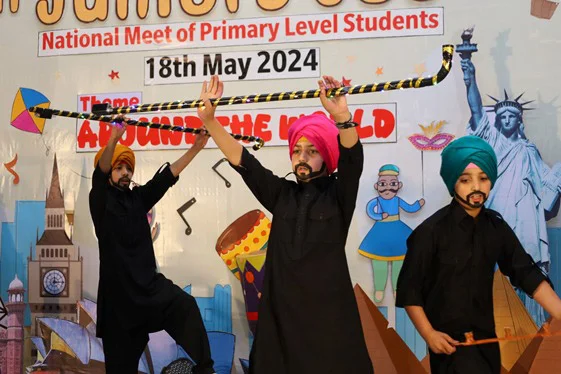 Students performing cultural dance in school event