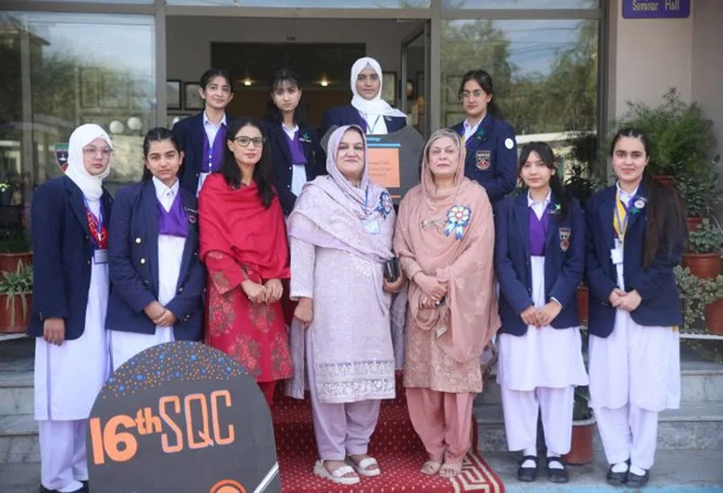 Students presenting on stage during school convention